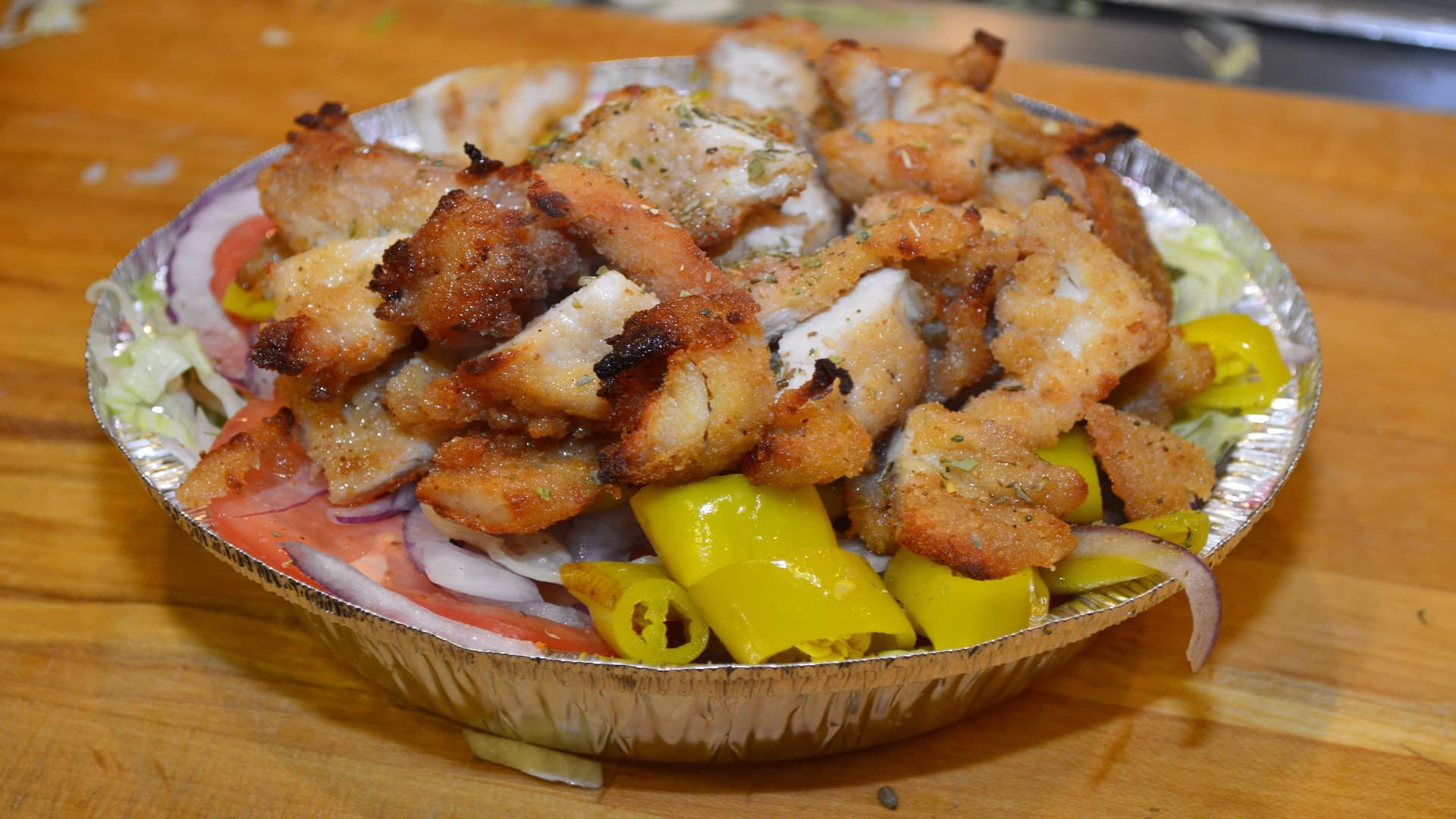 Fresh Chicken cutlet salad with spicy peppers